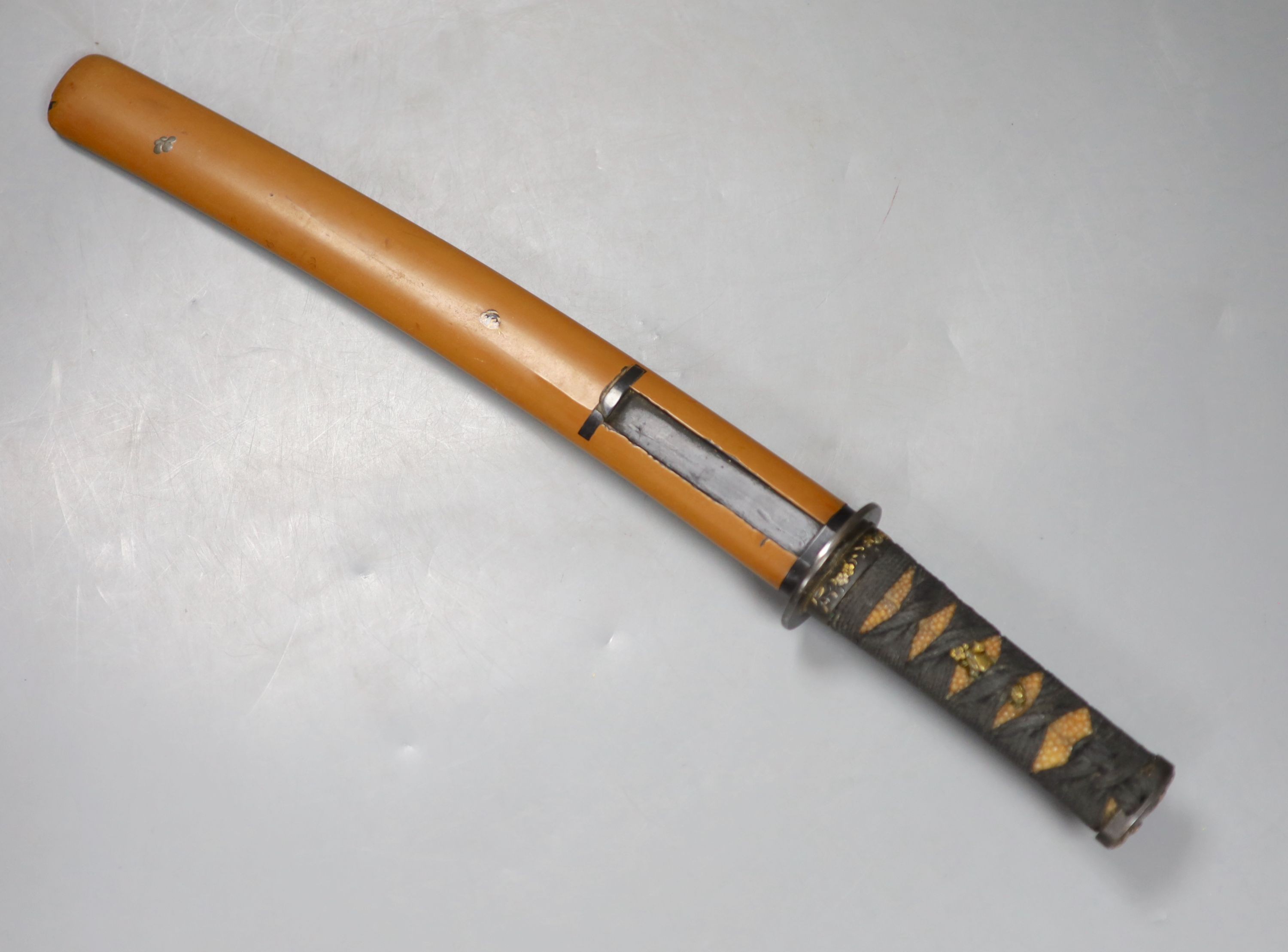 A Japanese tanto and scabbard, with associated fittings. Circa 1900